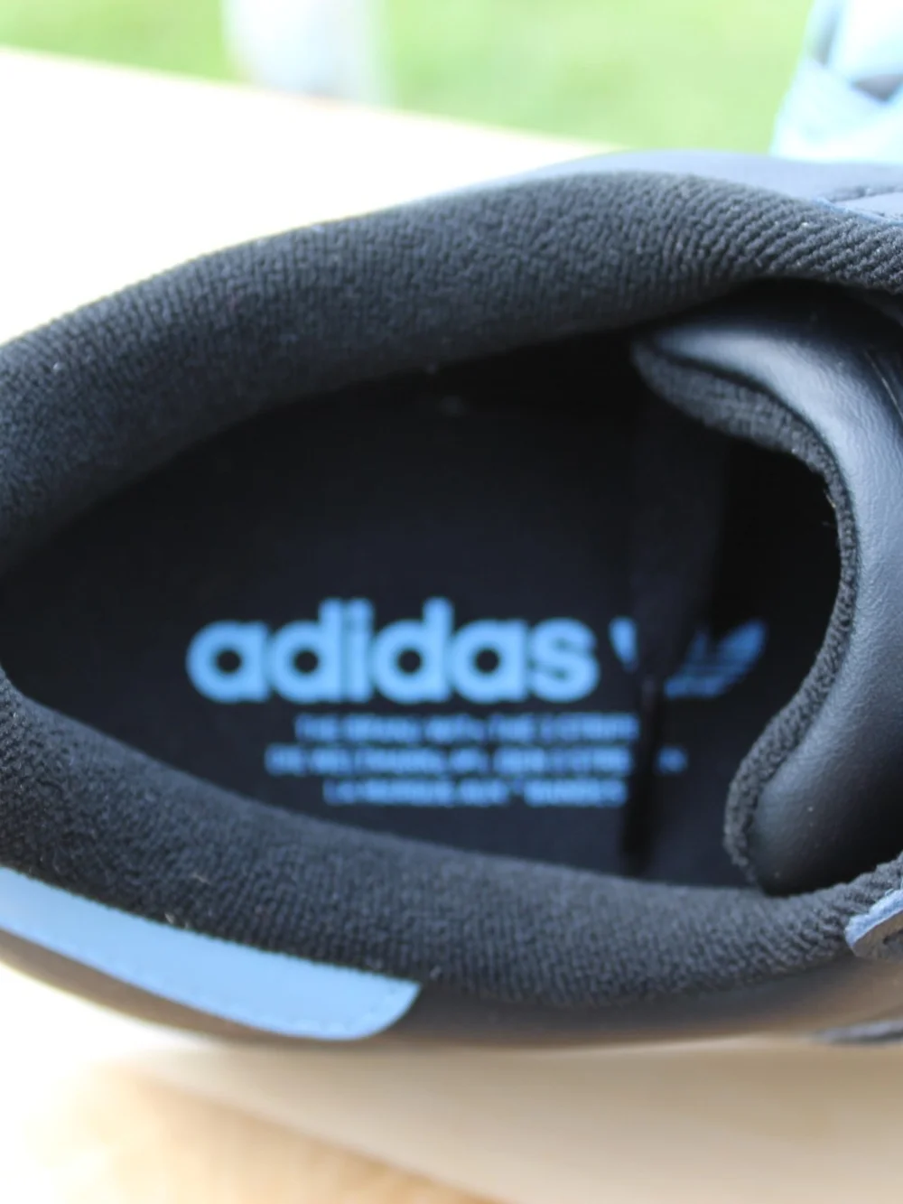 Adidas Superstar Black with Light Blue Stripes